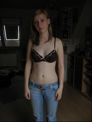 MIlka Stripping to Bra & Panties